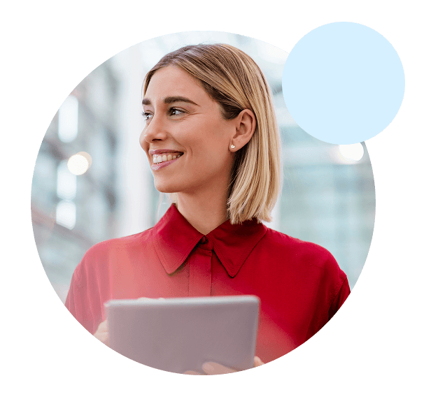Smiling professional holding a tablet